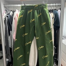 corteiz joggers green and yellow logo size small