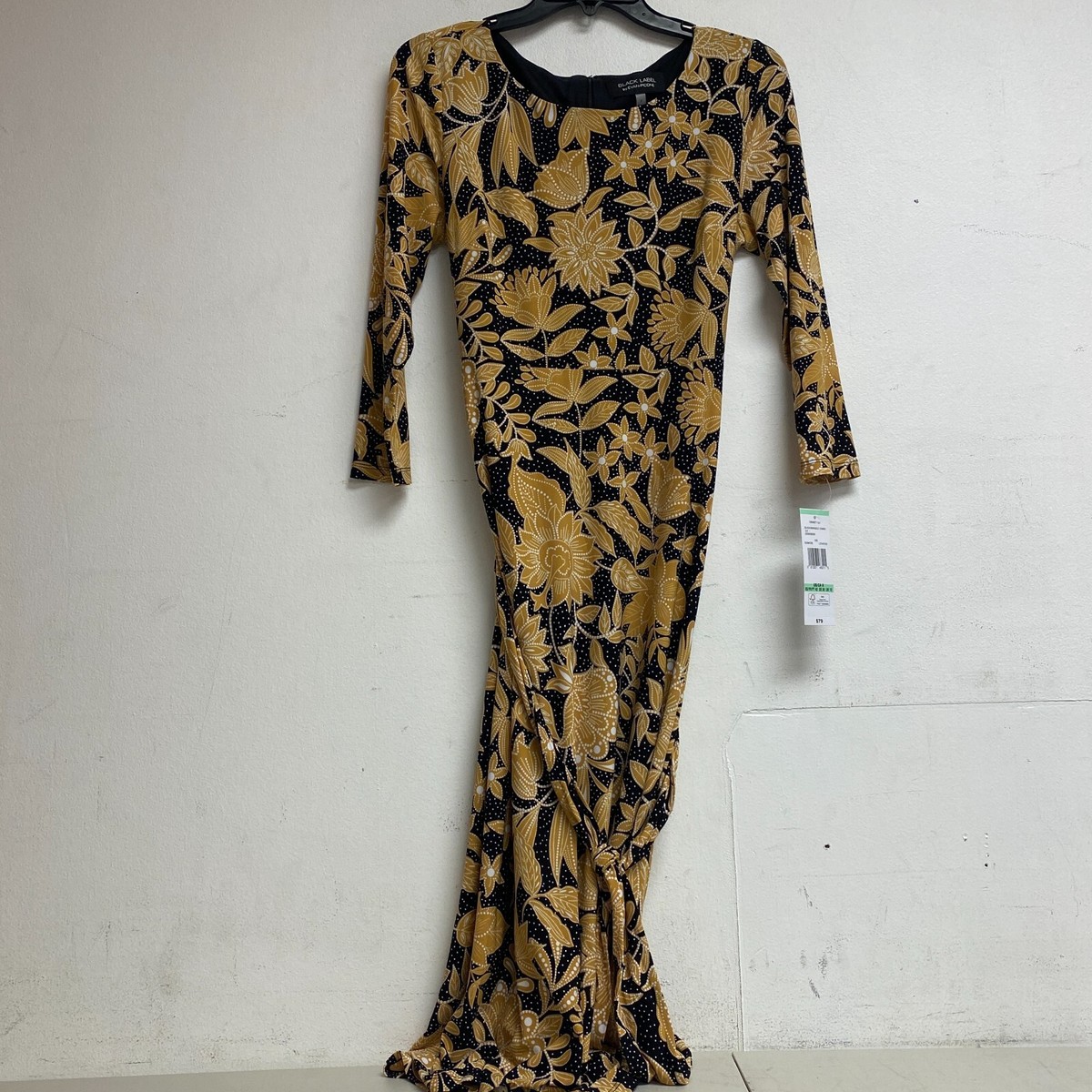 black and gold flare dress Gold and Black Faviana Long Prom Dress