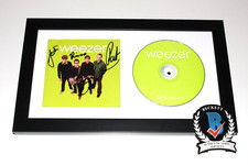 WEEZER BAND SIGNED FRAMED 'GREEN ALBUM' CD COVER BECKETT COA RIVERS CUOMO BAS WEEZER BAND SIGNED FRAMED 'GREEN ALBUM' CD COVER BECKETT COA RIVERS CUOMO BAS