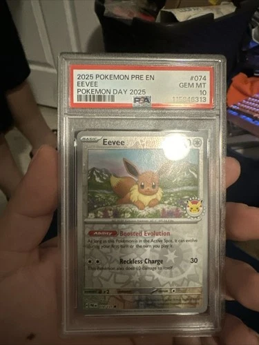 Eevee - (Pokemon Day 2025) (Reverse Cosmos Holo) 074/131 PSA 10