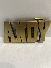 - Vintage 1980 s brass colored belt buckle, Andy Name