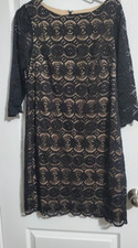 Jessica Howard Black lace overlay evening with a tan underlay| Back zipper.
