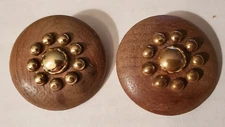 Two buttons 1 1/4 inch wood base with metal decorative design on top metal shank