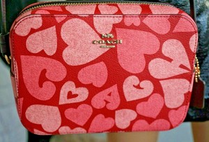 coach mini camera bolsa pink