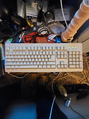 MITSUMI KFK-EA4XAT KEYBOARD, Beige, PS2, MISSING LIFT LEGS.