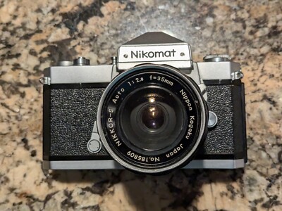 Nikormat FTN. No Light Meter. Nikor-s 35mm 2.8 Scratched Front Lens.  Parts/Rep.