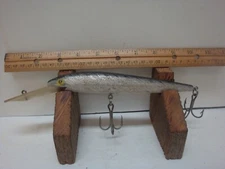 Rebel 7 Inch 1 1/2 oz Black & Silver Deep Diving Jerk Bait