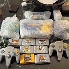 Nintendo 64 pikachu edition + 4 Controllers + 7 Games incredible condition.  — photo 1