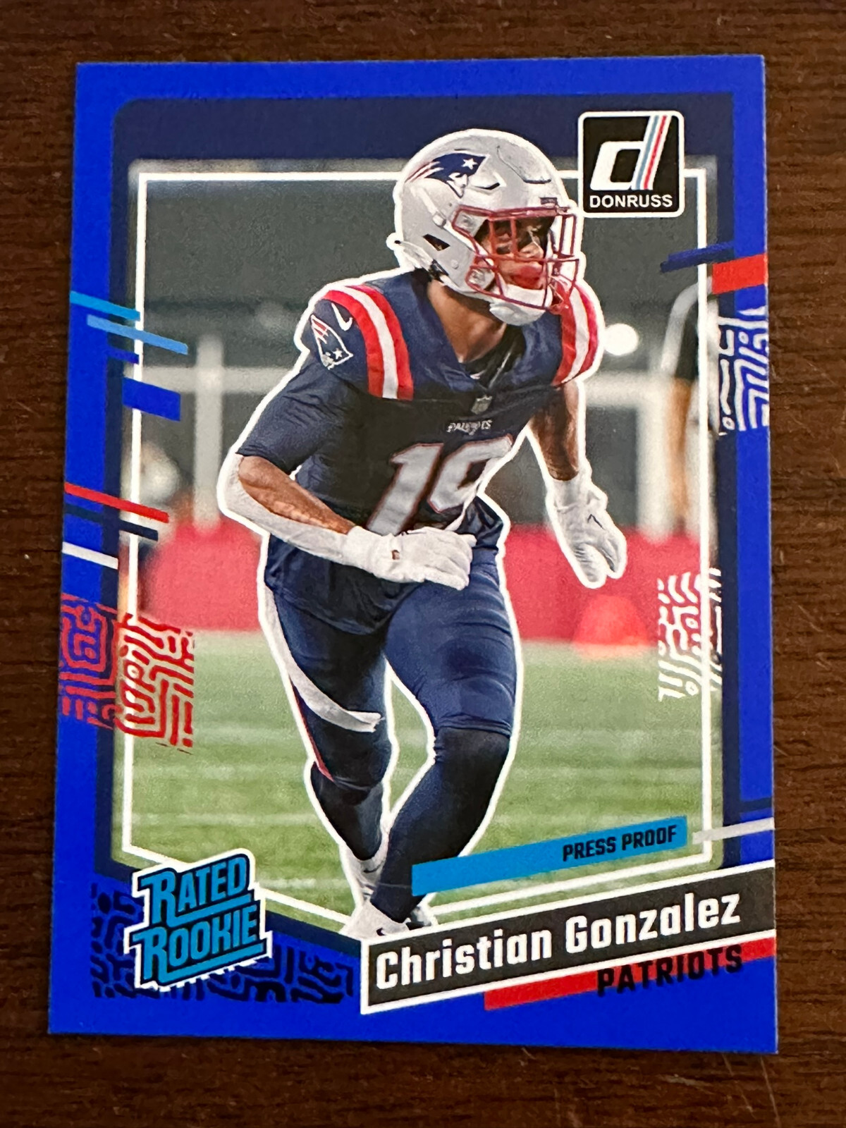 2023 Panini Donruss Blue Press Proof New England Patriots Christian Gonzalez 369
