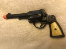 Vintage MORDT Cap Gun  Dart Shooter with Celluloid Grip Inserts 1930s 