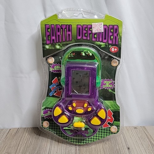 VTG Earth Defender Handheld Electronic Video Game Solar Tune Space NEW NIP - Afbeelding 1 van 7