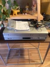 Memorex MVD4544 VHS/DVD Player W/ Remote, Cords, And Manual Tested Works Great