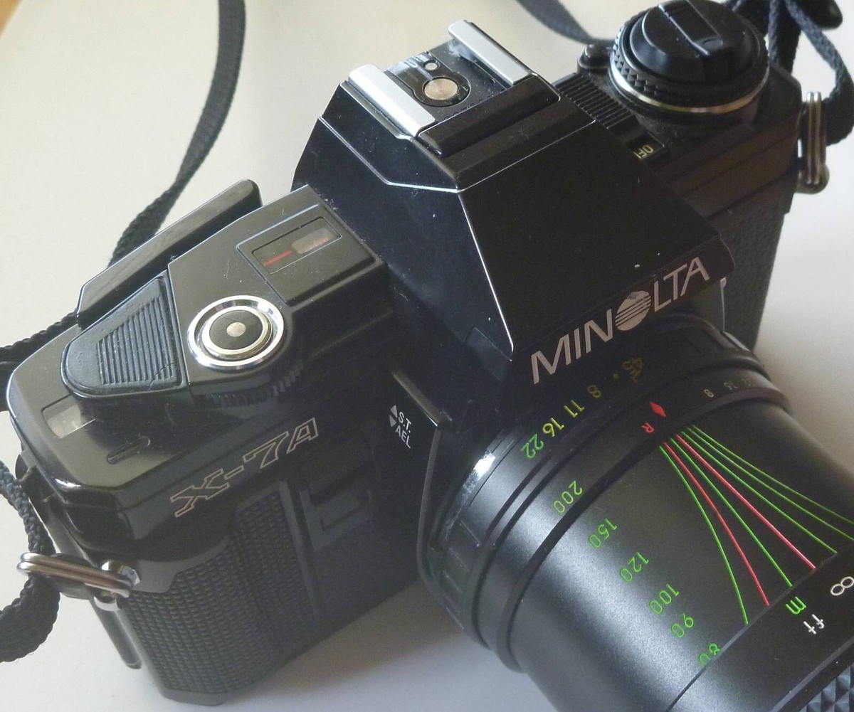 MINOLTA X-7A w/ lens STARBLITZ MC 80-200mm 1:4.5, strap and