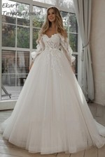 Wedding Dresses A-line Tulle Appliques Lace Spaghetti Strap V-neck Puff Sleeves
