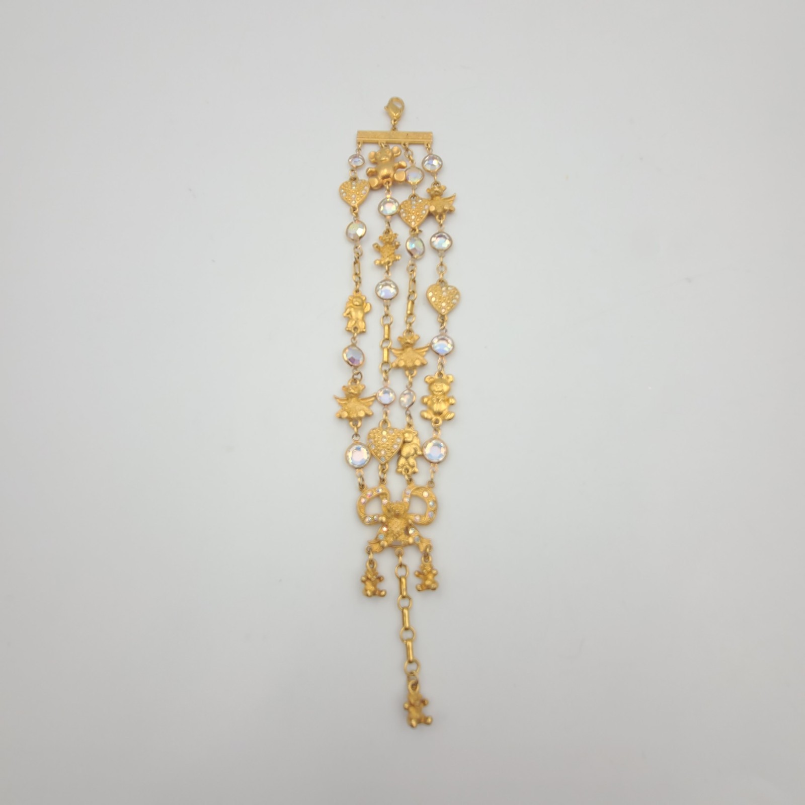 Kirks Folly Bracelet 4 Strand Teddy Bear Heart Bow Charm Goldtone Crystals