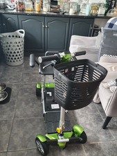 Folding electric mobility scooter