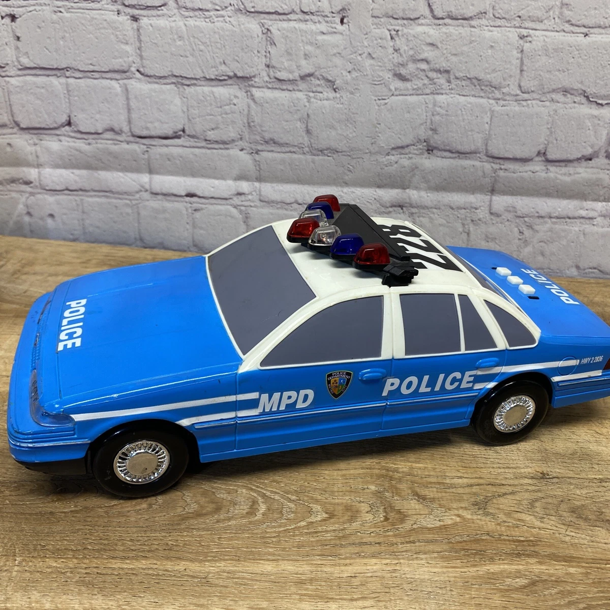 Toy police car with lights discount