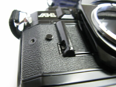 Canon A-1 film camera body with Genuine strap and Power Winder A2