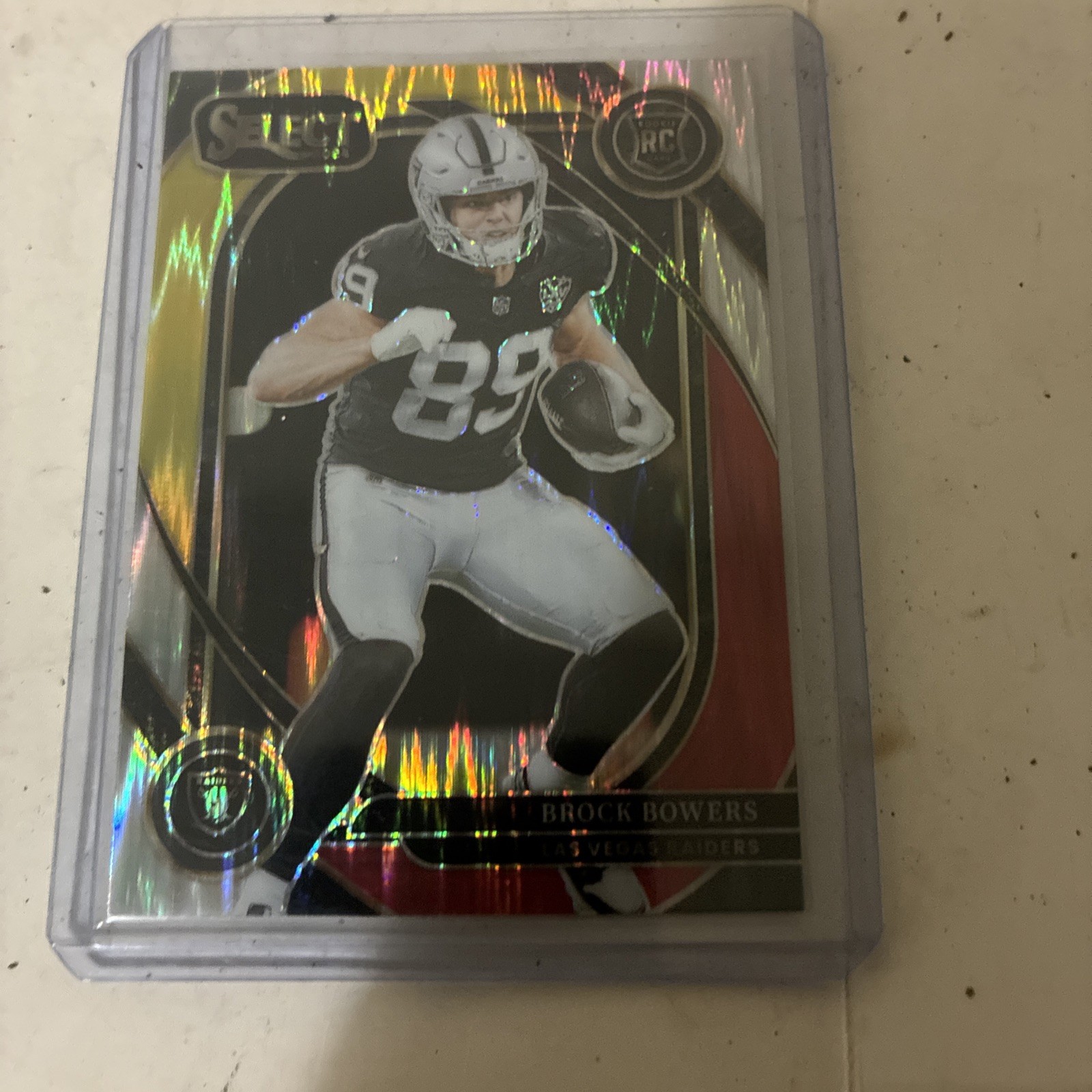 2024 Panini Select - Club Level Brock Bowers #222 Red & Yellow Shock Prizm (RC)