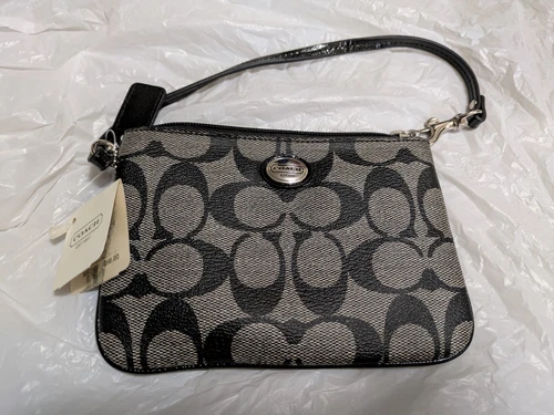 Bracciale Coach Peyton firmato in pelle con etichetta