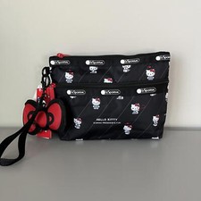 Lesportsac Hello Kitty Cosmetic Clutch with Charm NWT