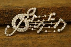 Vintage Costume Jewelry Rhinestone Treble Clef Musical Notes Score Brooch Pin