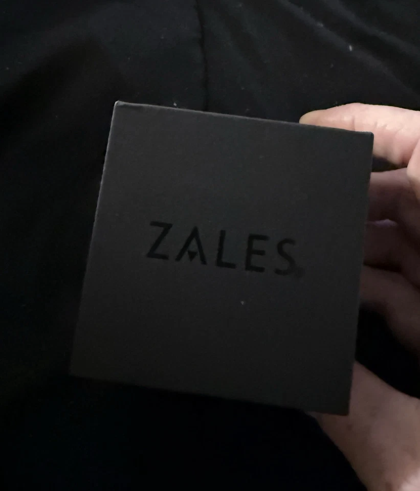 1/4 CT. T.W. Juego nupcial con marco de diamante con vástago torcido en plata de ley Foto 2 de 4