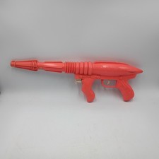 VINTAGE COSMIC WATER GUN IN ORANGE RAY SQUIRT GUN READ
