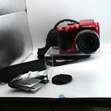 Samsung WB100 Red bodyBridge style digital camera with black sony case included