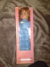 Bisque porcelain collectors doll with stand and certificate of authenticity 
