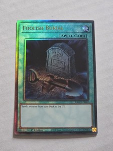 Foolish Burial - RA02-EN049 - Prismatic Ultimate Rare - 1st Edition