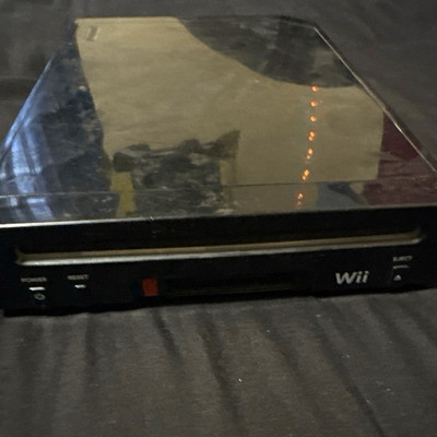 Nintendo Wii Black Console Bundle w/Wii Play, Ben 10 plus more games.