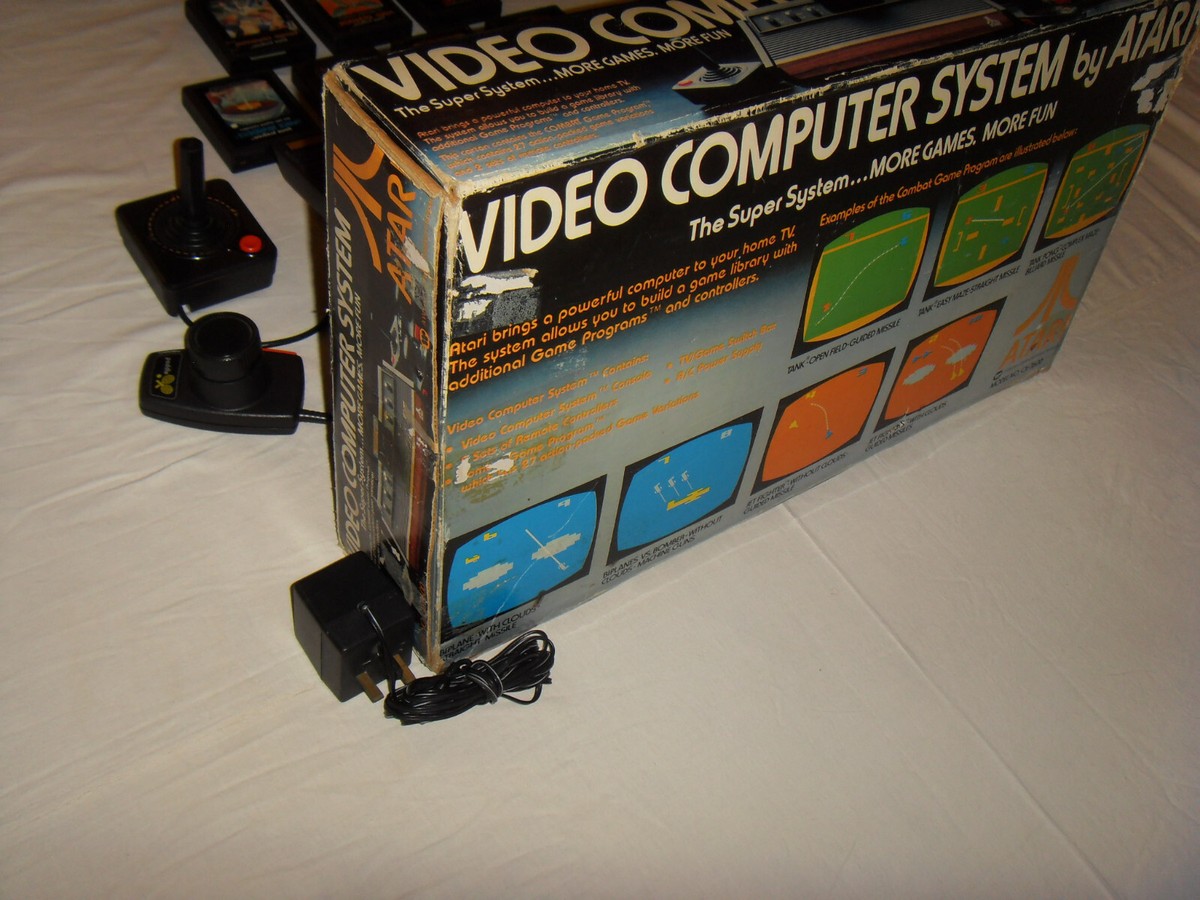 Console ATARI VCS 2600 Woody 6 Switchs PAL + 7 Jeux - Bon état, Boîte Incluse