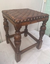Arts & Crafts oak stool with woven leather seat
