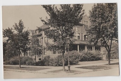 RPPC Tree lined street corner with large home - UK or USA