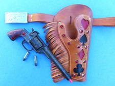 1930'S LASSO EM BILL CAST IRON CAP GUN WITH SUPERB REPRO. LEATHER HOLSTER SET