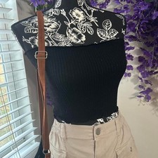 Black ribbed tube top by Bozzolo.