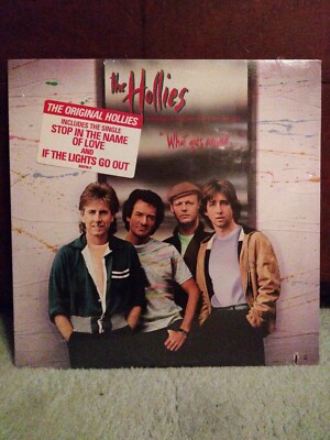 THE HOLLIES What Goes Around... HYPE STICKER 1983 LP SEALED NIP