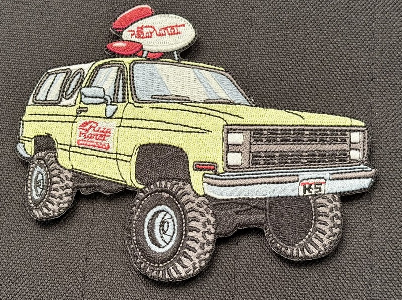 embroidered morale patch of Pizza Planet Blazer, Ltd. Edition