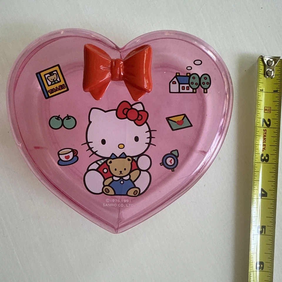 Caja de baratija de arco en forma de corazón de plástico transparente rosa Hello Kitty de colección 1991 rara Foto 2 de 4