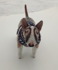 Miniature realistic copy of a dog - Bull Terrier