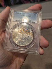 PCGS 1882-S MS63 Morgan Dollar w/ Crescent Rainbow Toning