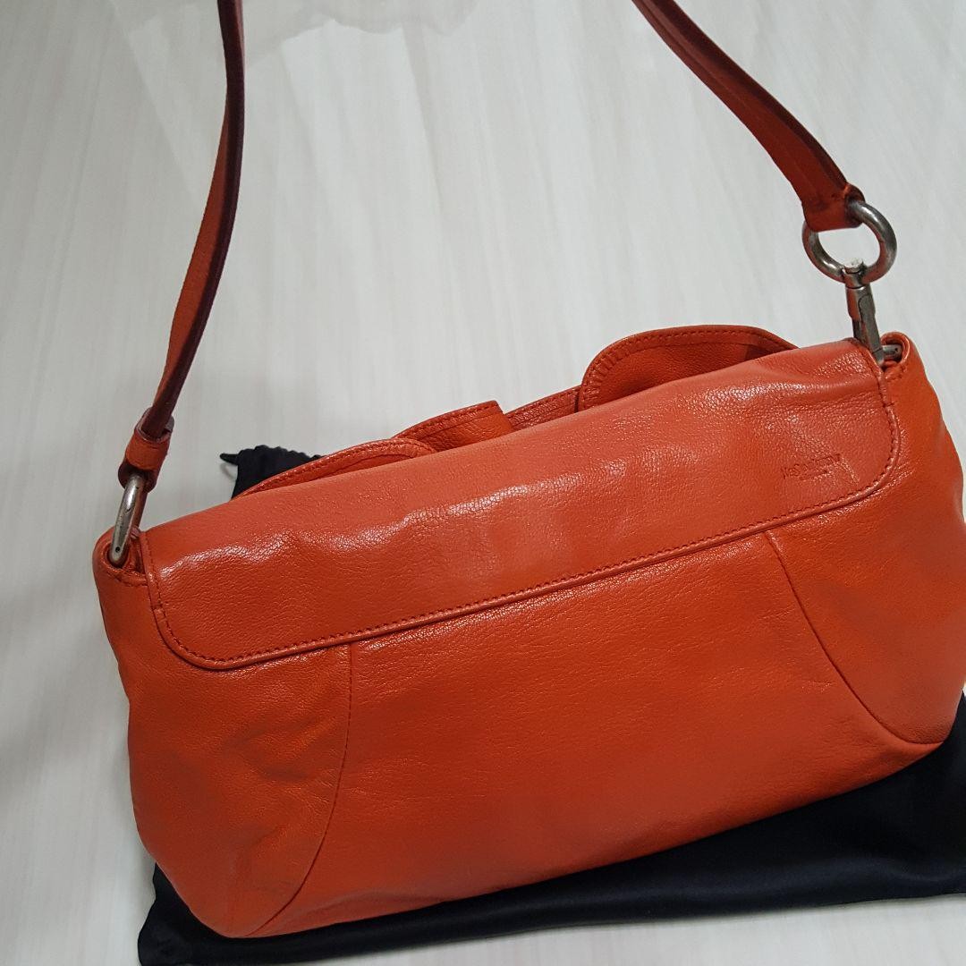 SAINT LAURENT Rara borsa a mano YSL Rive Gauche Naja Rose in pelle arancione design elegante