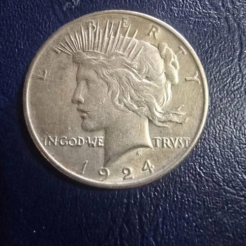 1924 $1 Peace Dollar. VERY GOOD.