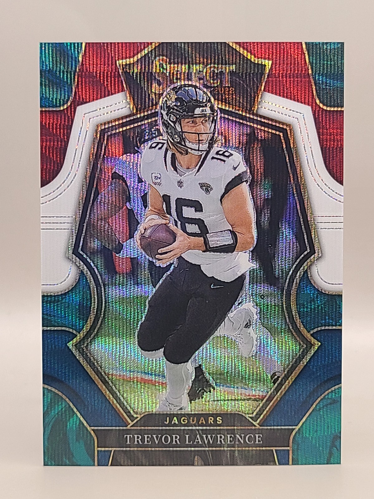 2022 Panini Select #145 Trevor Lawrence Tri-Color Prizm #/199