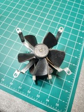 A7. WB26X114 GE Range/Oven Cooling Fan with Blade Assembly