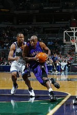 Voshon Lenard Toronto Raptors drives to the basket at the NBA gam- 2002 Photo