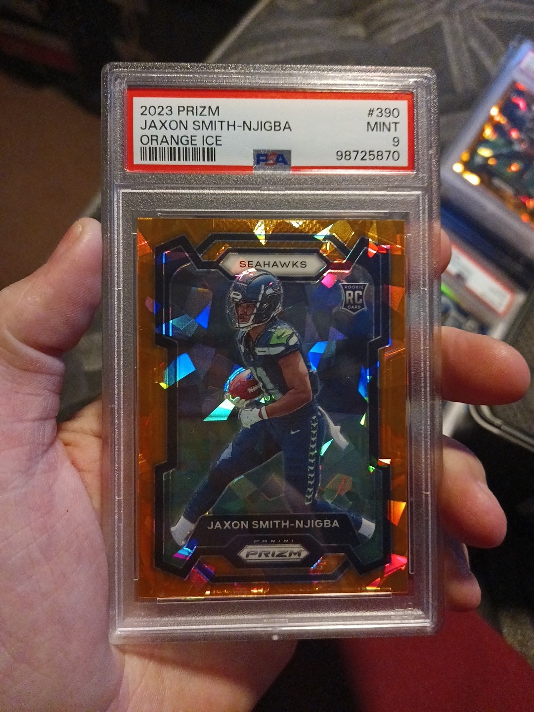 2023 Panini Prizm - Rookies Jaxon Smith-Njigba #390 Orange Ice Prizm (RC)