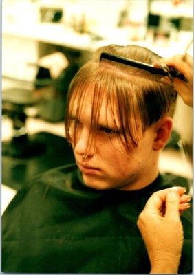 1990s Teen Getting Haircut With Wet Bangs In Salon Close Up Vintage Photo