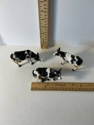 Black and white resin cow figurines Lot of three